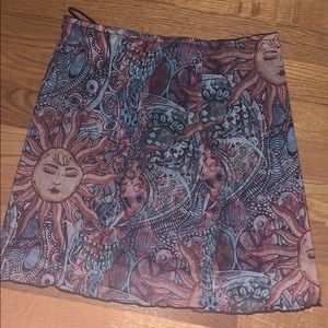 Sun and Patterned Mesh Skirt